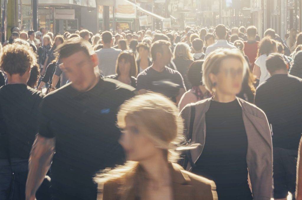 anonymous crowd of people on a shopping street